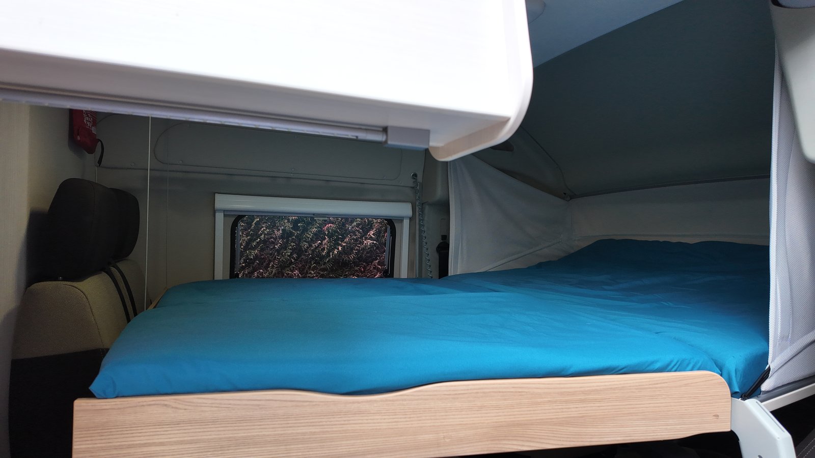 KNAUS campervan: view from the bed towards the kitchen